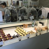 Les choix (de gauche à droite): fraisier, Jacky chocolat coco, tartelette au citron, baba au rhum rhubarbe pistache, œuf de Pâques, cake marbré, noisette, et sandwichs at VG Pâtisserie in Paris