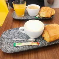 One breakfast special and one oat milk cappuccino with pain au chocolat  at VG Pâtisserie in Paris