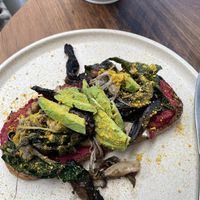 Mushrooms on sourdough - vegan option - forgot to take photo before I cut it in half!  at Combi in Byron Bay