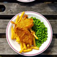 Tofish fillets with chips and peas at The Monument in Canterbury