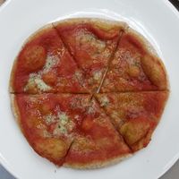 Thew small garlic pizza.....Yum! at Wholegrain Organics in Palmerston North