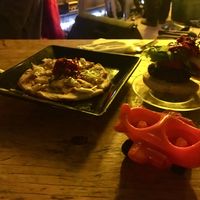 Burger and pizza  at L'Escalier in Montreal