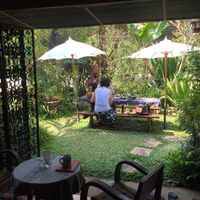Garden tables at Seven Elephants Cafe in Mae Hong Son