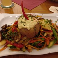Tofu with baked potatoe, asparagus and veggies at Stiftskeller in St Florian