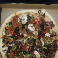 Deep dish with vegan sausage and vegan cheese. at Zaucer Pizza in Redmond