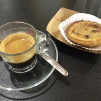 coffee with vegan pastel de nata  at Vegana By Tentúgal in Porto