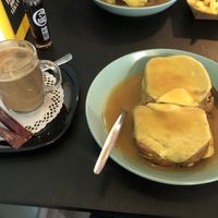 Tofu and grilled cheese toast with extra Francesinha sauce and cheese   at Vegana By Tentúgal in Porto