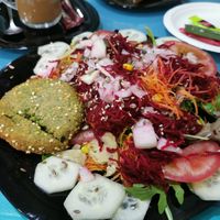 Salad with burger at Vegana By Tentúgal in Porto