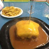 Vegan francesinha with fries at Vegana By Tentúgal in Porto