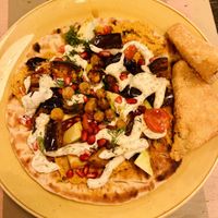 Aubergine & chickpea flatbread with hash browns  at Lounges - Brunello in Weston-super-mare