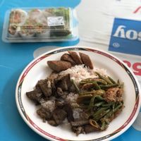 Vegan summer rolls for takeaway, vegan northern sausage, mushrooms steams, beans curry with rice  at Tien Sieng Vegetarian Foods in Chiang Mai