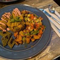 Falafel main with mushroom rice, spinach fritatta, roasted pumpkin, marinated olives and salad at Simone's Kitchen in Antwerpen
