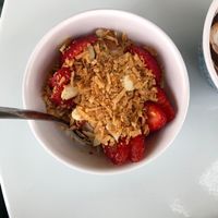 Gia - vegan frozen yogurt with coconut, almonds, and strawberries  at JOY in Shell Beach