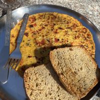 Vegan omelette   at Trimutri in Dharamkot