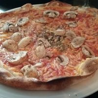 Funghi pizza with vegan cheese at Novecento in Haarlem