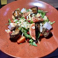 Salad with figs and glazed eggplant at OM NOM NOM in Lviv