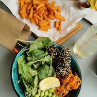 Bowl with tofu, edamame beans and vegetables at OM NOM NOM in Lviv
