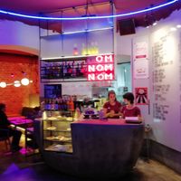 Inside, in the evening at OM NOM NOM in Lviv