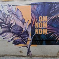 Mural outside om nom nom at OM NOM NOM in Lviv