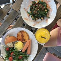 Salad and American breakfast  at OM NOM NOM in Lviv
