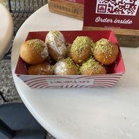 Icing sugar balls (left) and maple syrup balls (right)  at Lukumades in Athens
