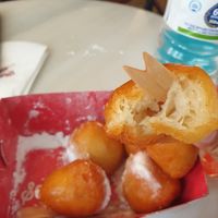 Lukumades with icing sugar €2.90 at Lukumades in Athens