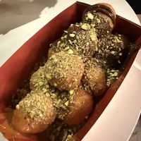 Half chocolate and half something else; pistachio on top    at Lukumades in Athens
