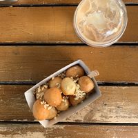 Lukumades with agave syrup & almond latte at Lukumades in Athens