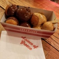 Chocolate and peanut butter sauce over praline filled at Lukumades in Athens