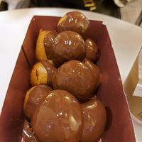 Drops of heaven covered in "bitter" chocolate at Lukumades in Athens