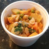 Sweet & white potato with spinach and chickpeas in a peanut butter type sauce. This was SOOOOO good!! I couldn't stop eating this! So yummy! at GOOD Grains in Toronto