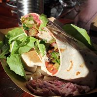 Falafel wrap with salad and dressing - vegan. at Ground Zero - Marley Coffee in Cape Town