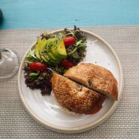 vegan salmon bagel with avocado side salad  at Wild Tribe Cafe in Koh Samui