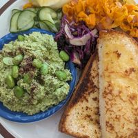 weekend vegan breakfast special: green hummus, toasted shokupan, other yum bits at Papirica in Collingwood