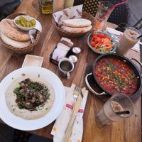 Hummus (unexpectedly delicious!) and shakshuka (tasty but has no tofu or other protein) at Pancake House TLV in Tel Aviv