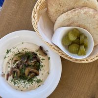 Hummus with mushrooms  at Pancake House TLV in Tel Aviv