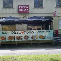 Outside the restaurant. There are nice seats outside the restaurant for sunny days. at Pizza Roma in Gothenburg