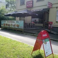 Outside the restaurant. There are nice seats outside the restaurant for sunny days. at Pizza Roma in Gothenburg