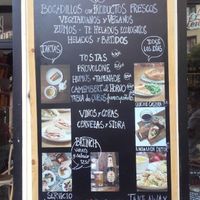 Sing outside the bakery at L'Adore Cafe Bistrot in Madrid