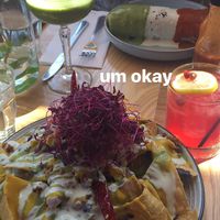 Nachos, burrito, jalapeño pomegranate cocktail, and matcha coconut cocktail  at Jajaja Mexicana - Lower East Side in New York City