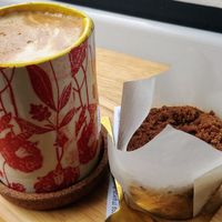 Soy flat white and muffin at Conscious Cravings Co in Mordialloc