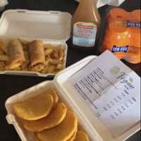 vegan potato fritters and v pud ( black pudding) supper  at Land and Sea Fish and Chip Shop in Polmont