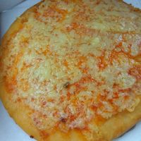 Deep fried pizza at Land and Sea Fish and Chip Shop in Polmont