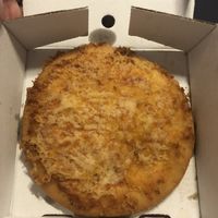 Deep fried vegan pizza at Land and Sea Fish and Chip Shop in Polmont