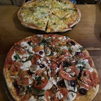 Pizza amazing😄(the one in front of me is the 4 quesos)  at NaturAle Cusco in Cusco