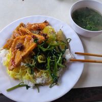 Full plate with noodles, vegetables, rice and tofu at Am Thuc Chay in Hue