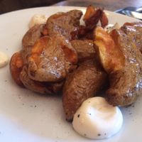 The house potatoes are so crispy on the outside, and tender on the inside, served with incredibly good cream sauce or their YUM-O ketchup! at The Gold Leaf in Fort Collins