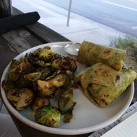 Buffalo lions Maine wrap with fried brussel sprouts - not gluten free at The Gold Leaf in Fort Collins
