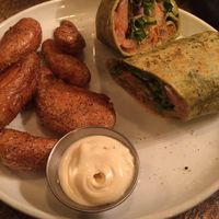 The Buffalo Lions Mane Wrap is SO SO amazing! The balance of flavors and textures are perfect -  crunchy fried mushrooms, crispy sauced greens, and oh so perfect onions! YUM! at The Gold Leaf in Fort Collins