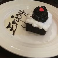 Chocolate cake with whipped soy cream and blueberry jam at Sushi Kitchen in Penang